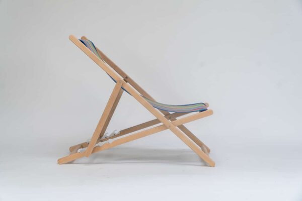 Beechwood Deckchair with Climbing Fabric - blue, green, yellow, red, and pink stripes, viewed from the side - created by Decks and Stipes Ireland