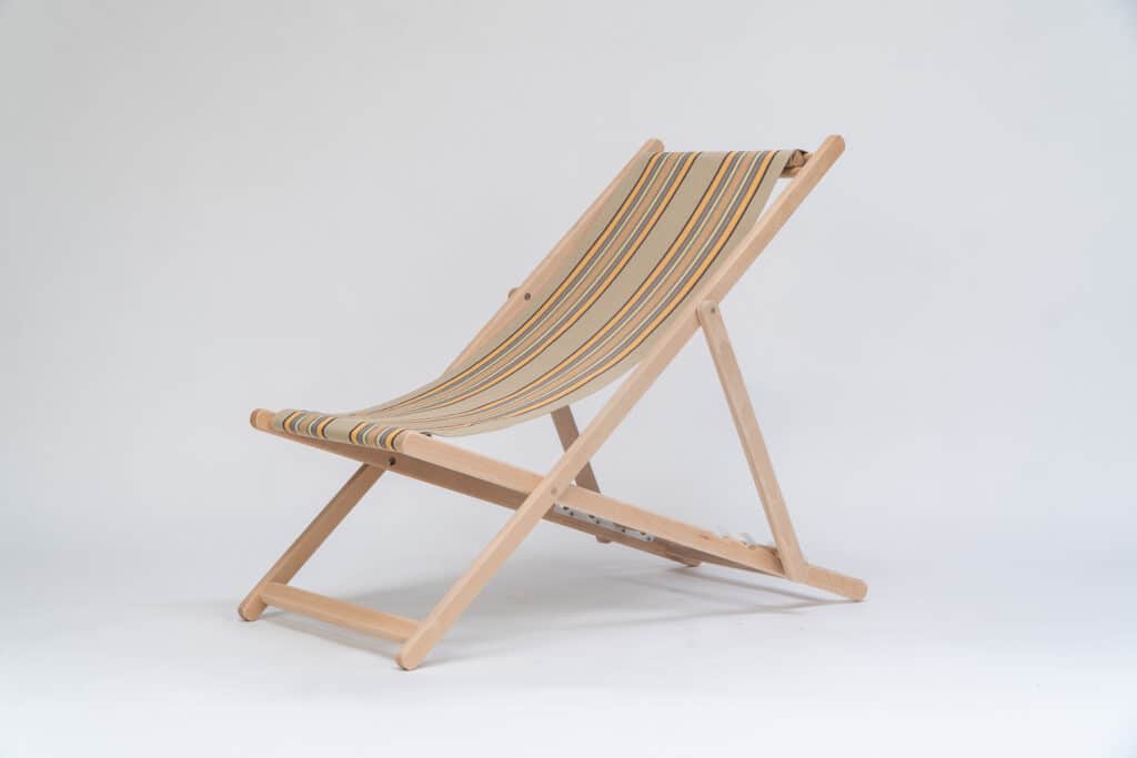 Beechwood Deckchair with Kickball fabric, khaki, coral, black and blue stripes, viewed from an angle - created by Decks and Stipes Ireland