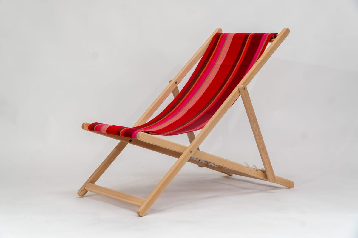 Beechwood Deckchair with Ping Pong fabric, red, pink and green stripes, viewed from an angle - created by Decks and Stipes Ireland