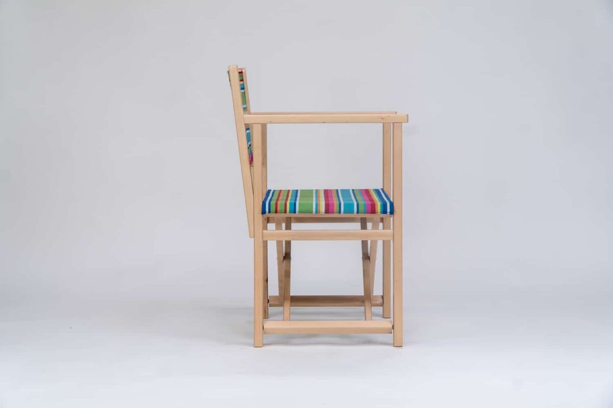 Beechwood Director's Chair with Climbing Fabric - blue, green, yellow, red and pink stripes, viewed from the side - created by Decks and Stipes Ireland
