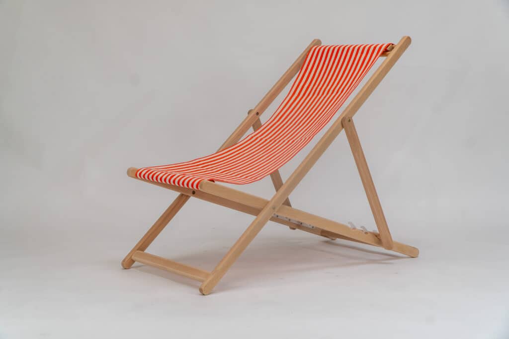 Beechwood Director's Chair with Clippo Orange fabric, orange and white stripes, viewed from an angle - created by Decks and Stipes Ireland