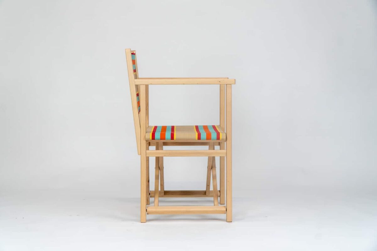 Beechwood Director's Chair with Dice Fabric, fawn, terracotta, turquoise, red and yellow stripes, viewed from the side - created by Decks and Stipes Ireland