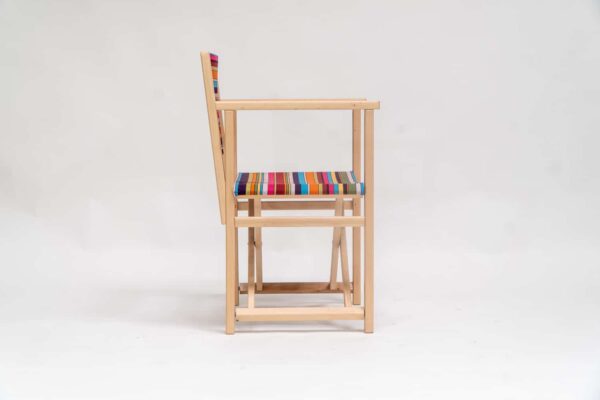 Beechwood Director's Chair with Paintballing fabric, blue, green, orange, yellow pink and red stripes, viewed from the side - created by Decks and Stipes Ireland