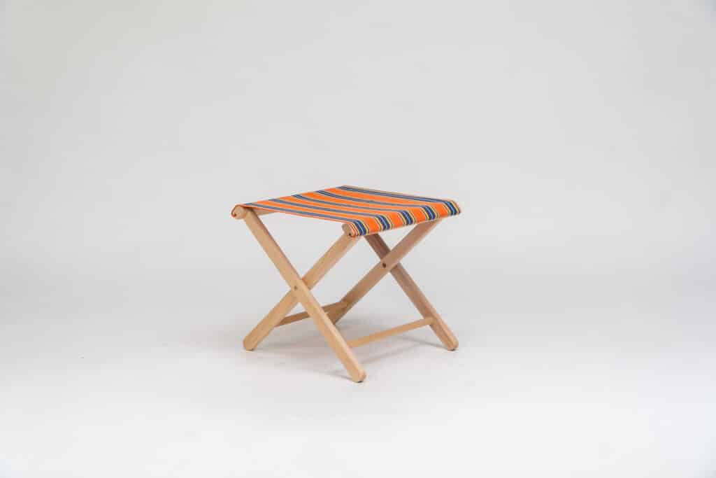 Beechwood Stool with Jazz fabric, rust, blue, yellow, white and black stripes - created by Decks and Stipes Ireland