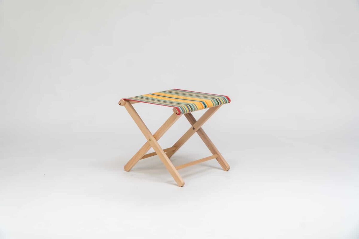 Beechwood Stool with Medley fabric, red, orange, green, black, yellow and blue stripes - created by Decks and Stipes Ireland