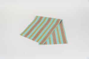 Petanque fabric, turquoise, terracotta, blue, lime and green stripes by Decks and Stripes Ireland
